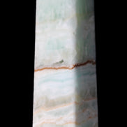 Pistachio Calcite obelisk 122mm 290g in sunlight - Rocks and Things Store