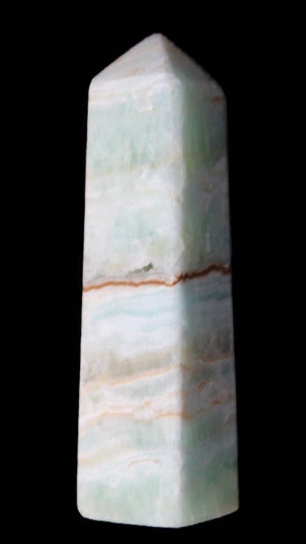 Pistachio Calcite obelisk 122mm 290g in sunlight - Rocks and Things Store