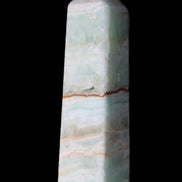 Pistachio Calcite obelisk 122mm 290g in sunlight - Rocks and Things Store