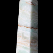 Pistachio Calcite obelisk 122mm 290g in sunlight - Rocks and Things Store