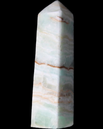 Pistachio Calcite obelisk 122mm 290g in sunlight - Rocks and Things Store