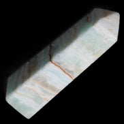 Pistachio Calcite obelisk 122mm 290g in sunlight - Rocks and Things Store