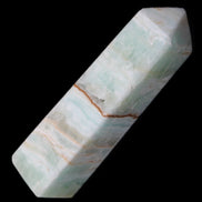 Pistachio Calcite obelisk 122mm 290g in sunlight - Rocks and Things Store
