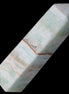 Pistachio Calcite obelisk 122mm 290g in sunlight - Rocks and Things Store