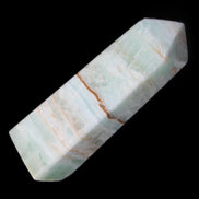 Pistachio Calcite obelisk 122mm 290g in sunlight - Rocks and Things Store