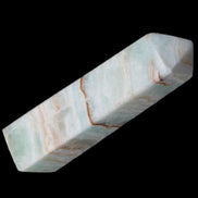 Pistachio Calcite obelisk 122mm 290g in sunlight - Rocks and Things Store