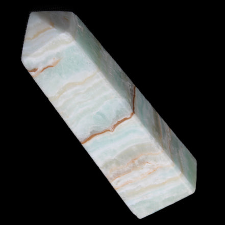 Pistachio Calcite obelisk 122mm 290g in sunlight - Rocks and Things Store