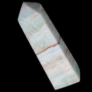 Pistachio Calcite obelisk 122mm 290g in sunlight - Rocks and Things Store