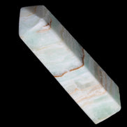 Pistachio Calcite obelisk 122mm 290g in sunlight - Rocks and Things Store