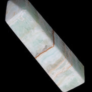 Pistachio Calcite obelisk 122mm 290g in sunlight - Rocks and Things Store