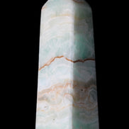 Pistachio Calcite obelisk 122mm 328g in sunlight - Rocks and Things Store