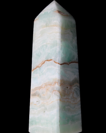 Pistachio Calcite obelisk 122mm 328g in sunlight - Rocks and Things Store
