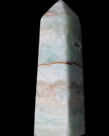 Pistachio Calcite obelisk 122mm 328g in sunlight - Rocks and Things Store