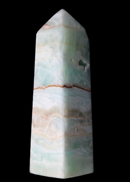 Pistachio Calcite obelisk 122mm 328g in sunlight - Rocks and Things Store