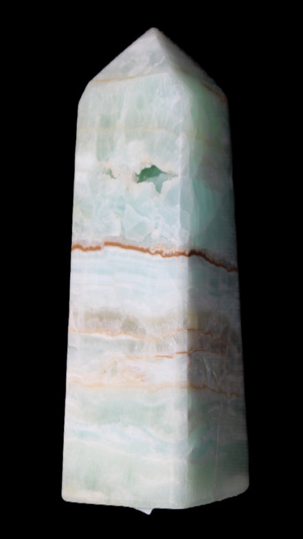 Pistachio Calcite obelisk 122mm 328g in sunlight - Rocks and Things Store