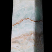 Pistachio Calcite obelisk 122mm 328g in sunlight - Rocks and Things Store