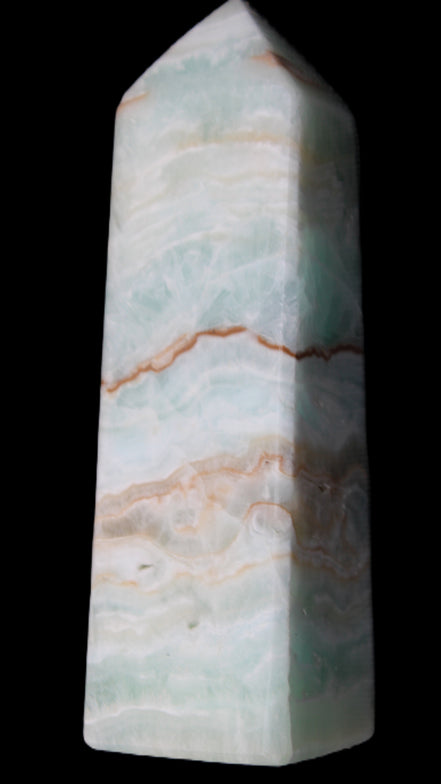 Pistachio Calcite obelisk 122mm 328g in sunlight - Rocks and Things Store