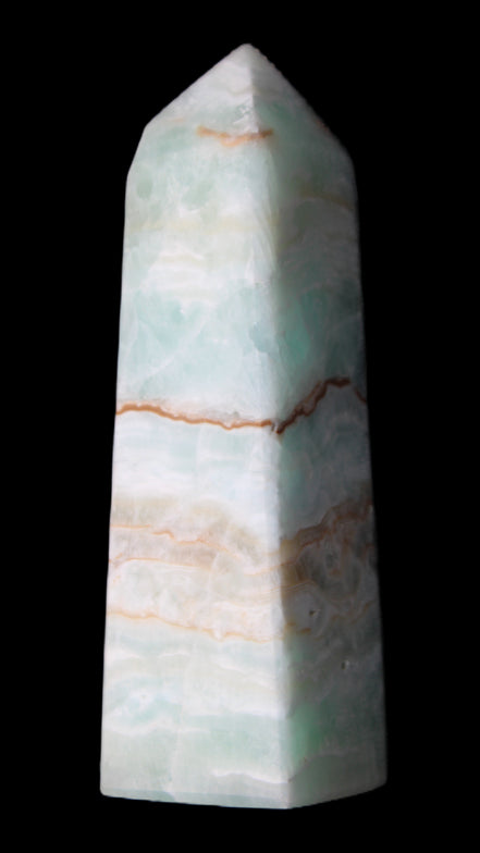 Pistachio Calcite obelisk 122mm 328g in sunlight - Rocks and Things Store