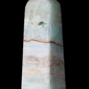 Pistachio Calcite obelisk 122mm 328g in sunlight - Rocks and Things Store