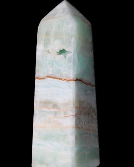 Pistachio Calcite obelisk 122mm 328g in sunlight - Rocks and Things Store