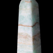 Pistachio Calcite obelisk 122mm 328g in sunlight - Rocks and Things Store