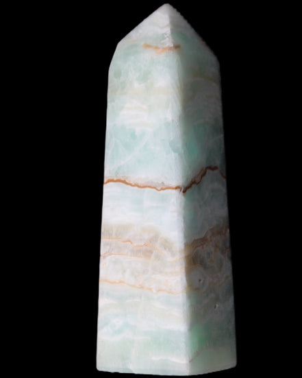 Pistachio Calcite obelisk 122mm 328g in sunlight - Rocks and Things Store