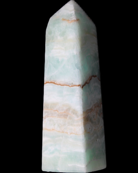 Pistachio Calcite obelisk 122mm 328g in sunlight - Rocks and Things Store