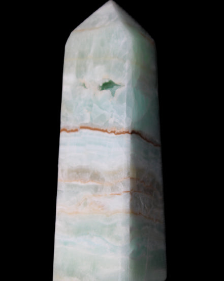 Pistachio Calcite obelisk 122mm 328g in sunlight - Rocks and Things Store
