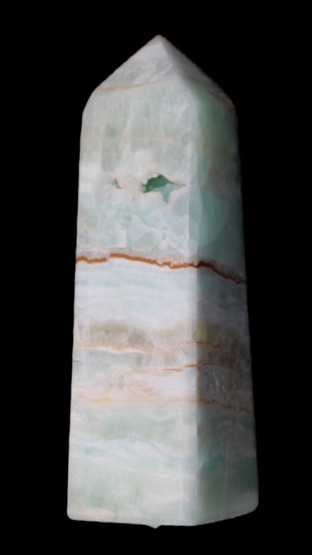 Pistachio Calcite obelisk 122mm 328g in sunlight - Rocks and Things Store