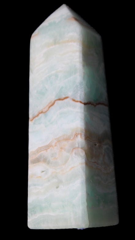 Pistachio Calcite obelisk 122mm 328g in sunlight - Rocks and Things Store