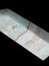Pistachio Calcite obelisk 122mm 328g in sunlight - Rocks and Things Store