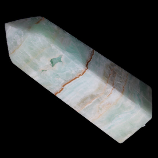 Pistachio Calcite obelisk 122mm 328g in sunlight - Rocks and Things Store
