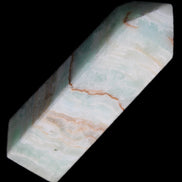 Pistachio Calcite obelisk 122mm 328g in sunlight - Rocks and Things Store
