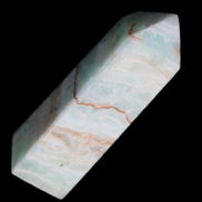 Pistachio Calcite obelisk 122mm 328g in sunlight - Rocks and Things Store