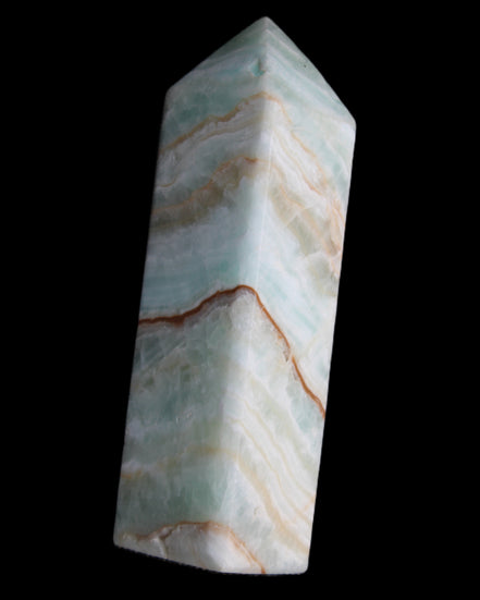 Pistachio Calcite obelisk 120mm 300g in sunlight - Rocks and Things Store