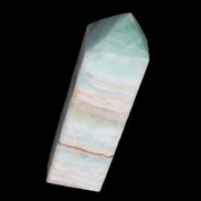 Pistachio Calcite obelisk 120mm 300g in sunlight - Rocks and Things Store