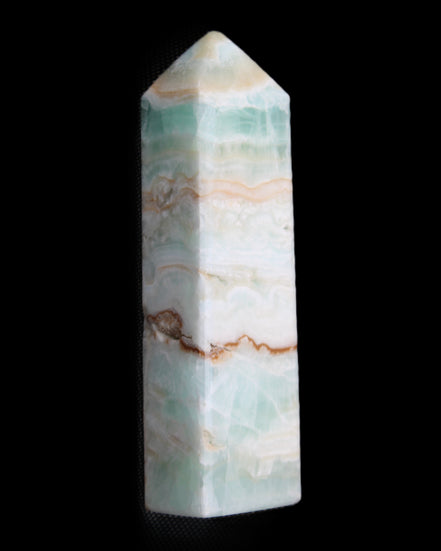 Pistachio Calcite obelisk 118mm 258g in sunlight - Rocks and Things Store