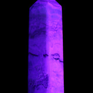 Pistachio Calcite obelisk 118mm 258g in UV light - Rocks and Things Store