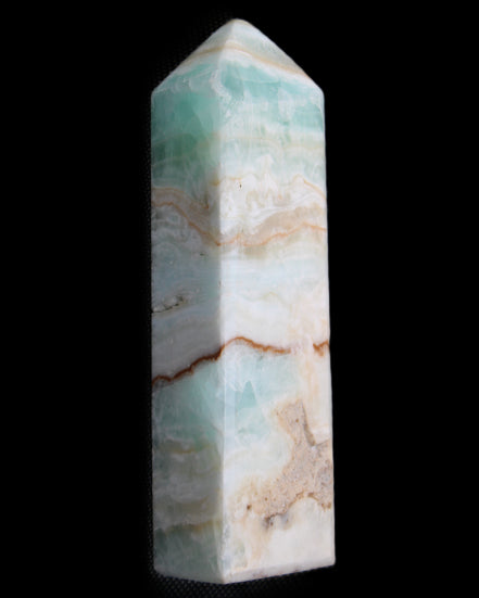 Pistachio Calcite obelisk 118mm 258g in sunlight - Rocks and Things Store