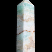 Pistachio Calcite obelisk 118mm 258g in sunlight - Rocks and Things Store