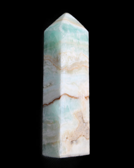 Pistachio Calcite obelisk 118mm 258g in sunlight - Rocks and Things Store