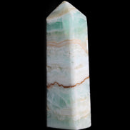 Pistachio Calcite obelisk 118mm 258g in sunlight - Rocks and Things Store