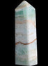 Pistachio Calcite obelisk 118mm 258g in sunlight - Rocks and Things Store