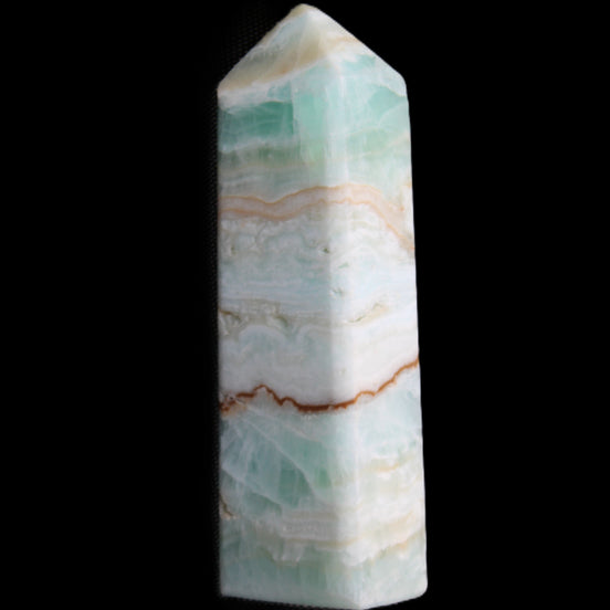 Pistachio Calcite obelisk 118mm 258g in sunlight - Rocks and Things Store