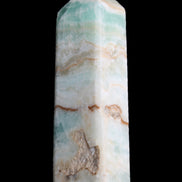 Pistachio Calcite obelisk 118mm 258g in sunlight - Rocks and Things Store