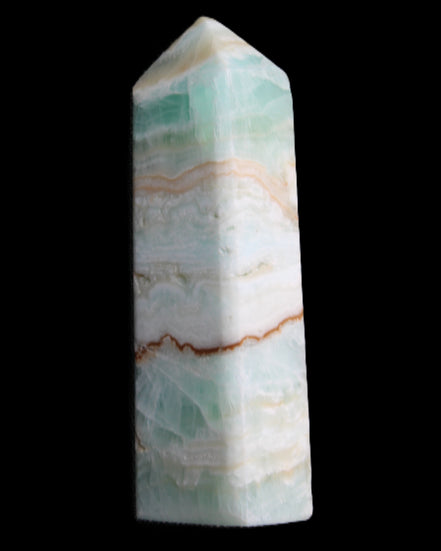 Pistachio Calcite obelisk 118mm 258g in sunlight - Rocks and Things Store