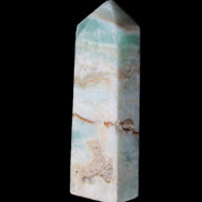 Pistachio Calcite obelisk 118mm 258g in sunlight - Rocks and Things Store