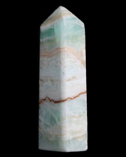 Pistachio Calcite obelisk 118mm 258g in sunlight - Rocks and Things Store