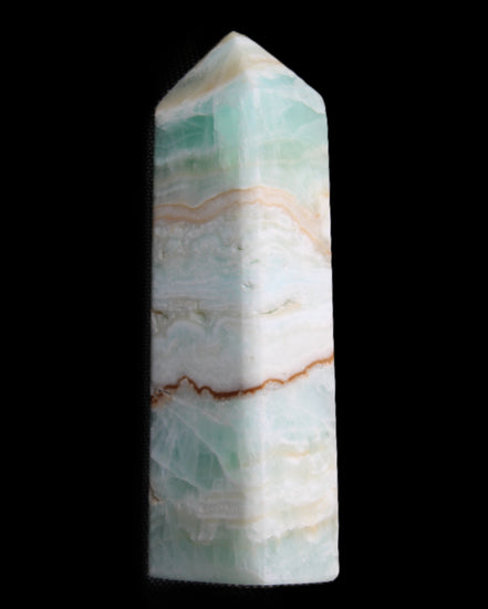 Pistachio Calcite obelisk 118mm 258g in sunlight - Rocks and Things Store