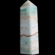 Pistachio Calcite obelisk 118mm 258g in sunlight - Rocks and Things Store